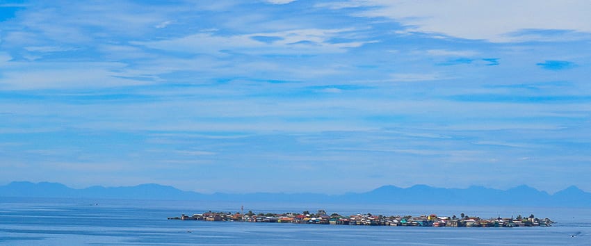 The Cay just off Guanaja with the hills of Honduras visible in the background