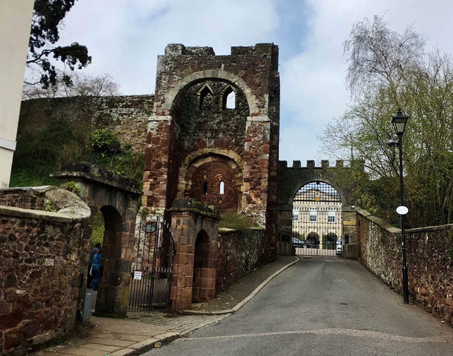 10+ of the Best Weekends in Devon 7 Red stone ruins of Rougemont Castle in Exeter showing the ruined keep with arches