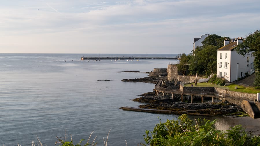 20+ of the Best Things to do in Port St Mary, Isle of Man 15 The Catwalk elevated walkway around the bay with the pier in the distance