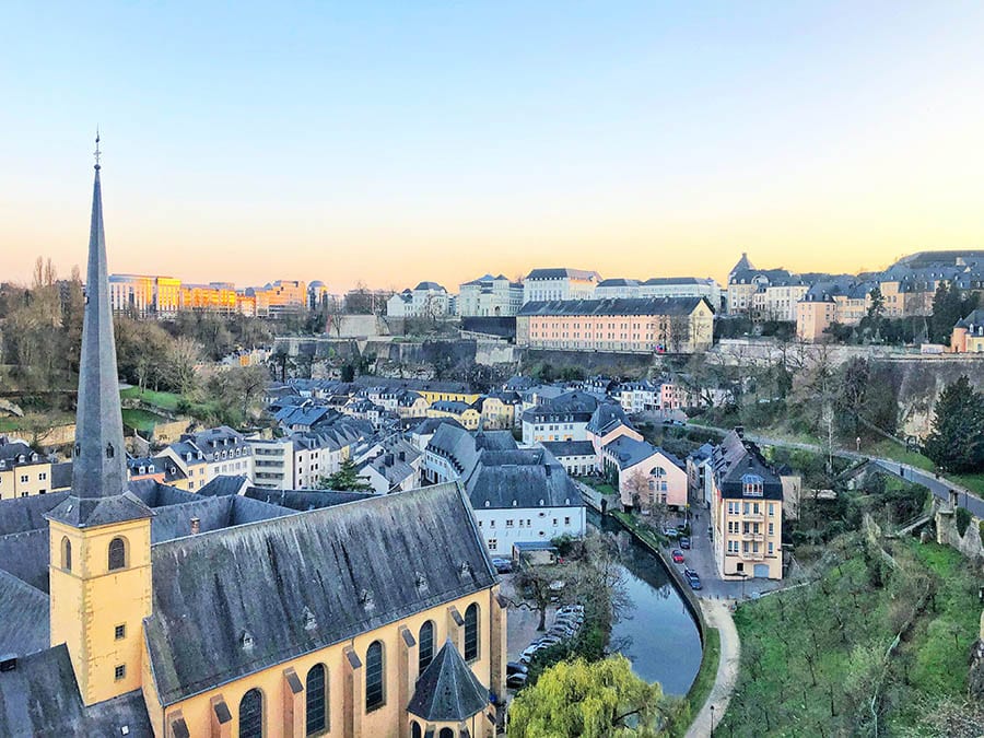 view over Luxembourg town and the slate coloured roofs on top of the long pastel buildings
