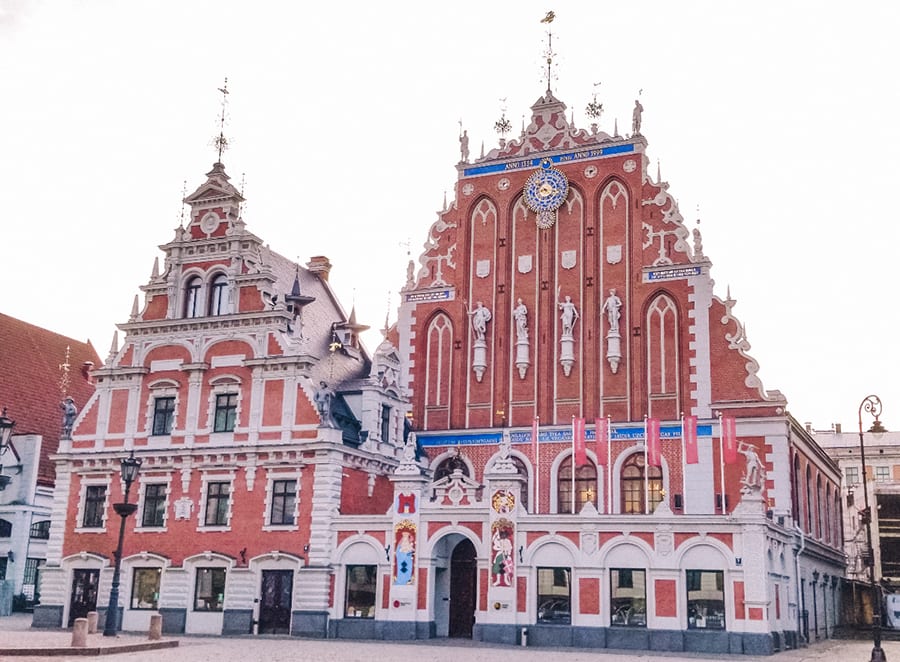 Ornate architectural red and white buildings in Riga