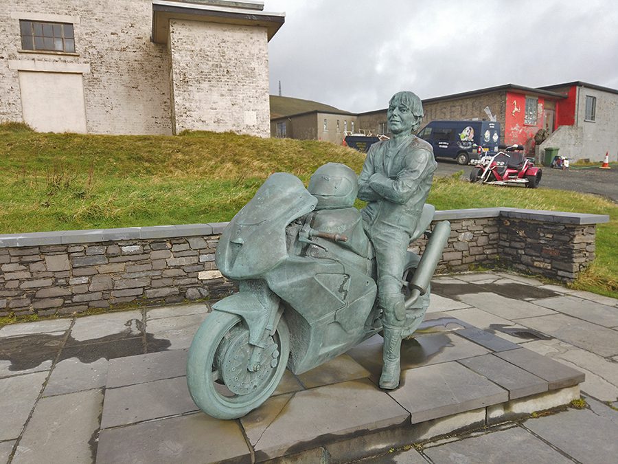 15+ Of The Best Things To Do On The Isle Of Man 14 sculpture of a man called Joey Dunlop on a motorbike