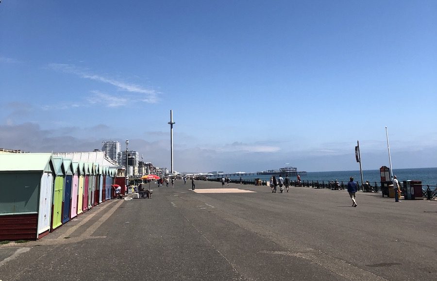 The Absolute Best Cities In The Uk To Visit With Map 6 view of Brighton Pier with colourful beach huts on the left