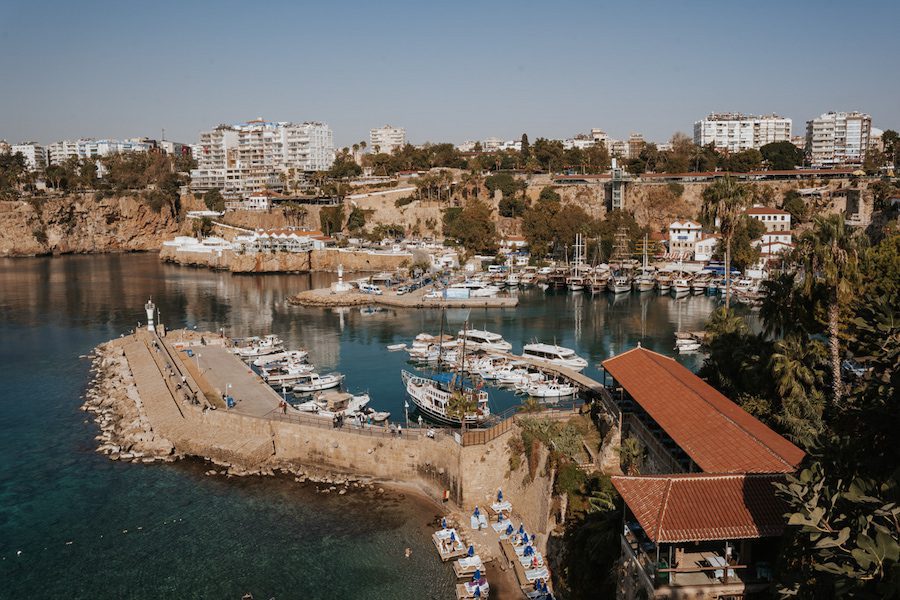 25 Amazing Destinations for Winter Sun around the World 17 harbour at Antalya in Turkey with sail boats around the harbour and blocks of flats behind