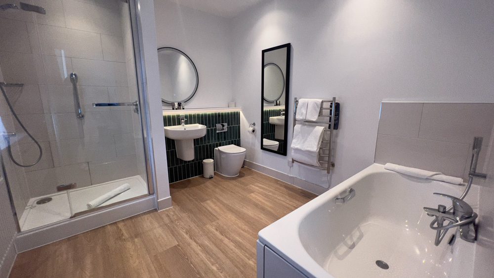 Heythrop Park by Warner Hotels, Luxury in the Cotswolds 6 The large bathroom with bath, large shower and large mirrors