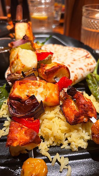 Heythrop Park by Warner Hotels, Luxury in the Cotswolds 18 Supper in the Travelling Duke with vegetable and halloumi kebab with pitta bread on a bed of yellow rice