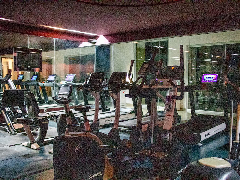 The Elegant VIP Suites at The Royal Thalassa Monastir 30 a room with exercise machines and a large window