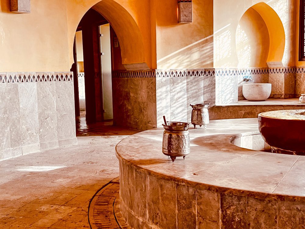 The Elegant VIP Suites at The Royal Thalassa Monastir 13 a large stone bathtub with a large bowl on the side