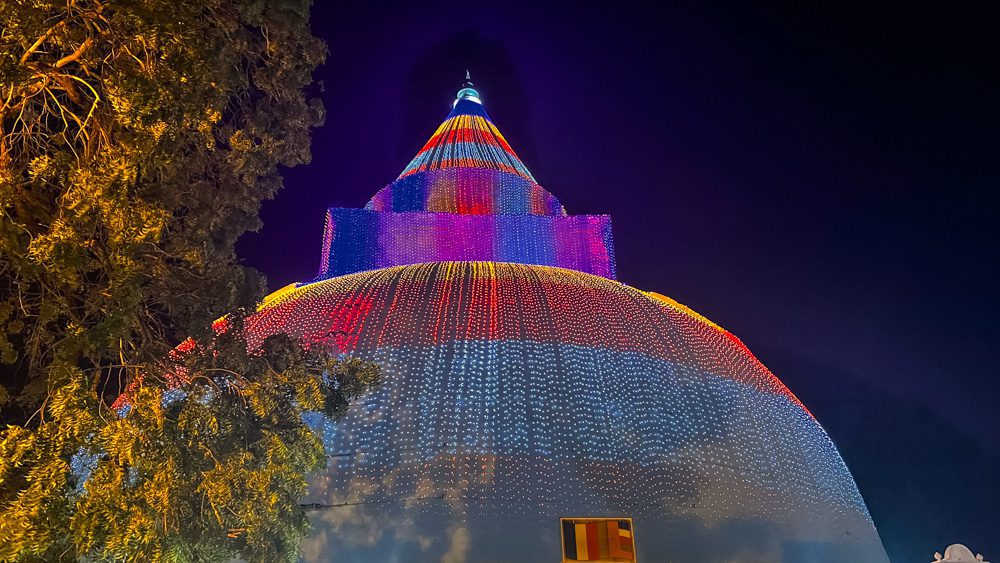 Why Amazing Sri Lanka Should Be Your Next Travel Destination (2025) 11 Stupa covered in festive lights