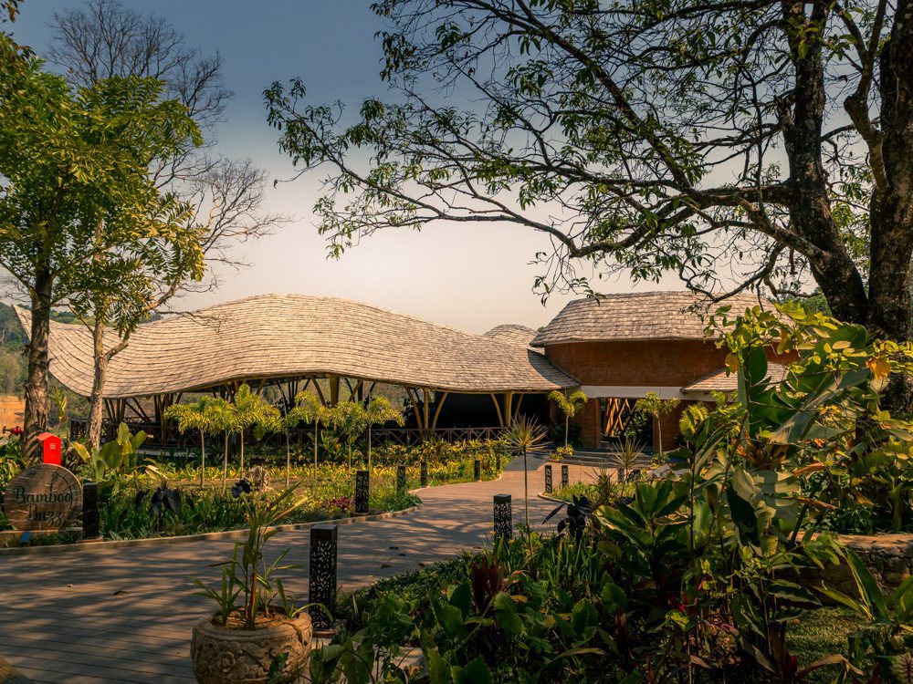 Stunning Timbertales In Coorg: A Tranquil Escape In Karnataka (2025) 14 Bamboo Buzz restaurant at Timbertales with undulating roofs
