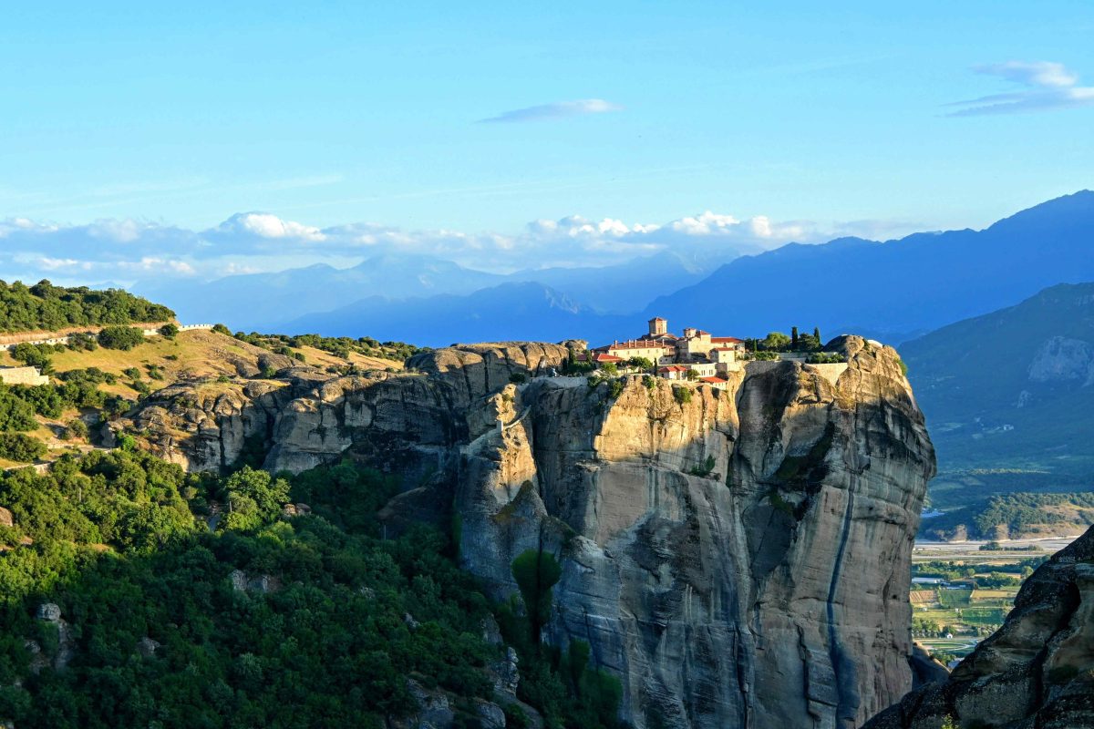 13 Amazing Unesco Sites In Greece: Ancient Ruins, Monasteries &Amp; More (With Map) 6 Meteora at sunset sitting on top of the cliff