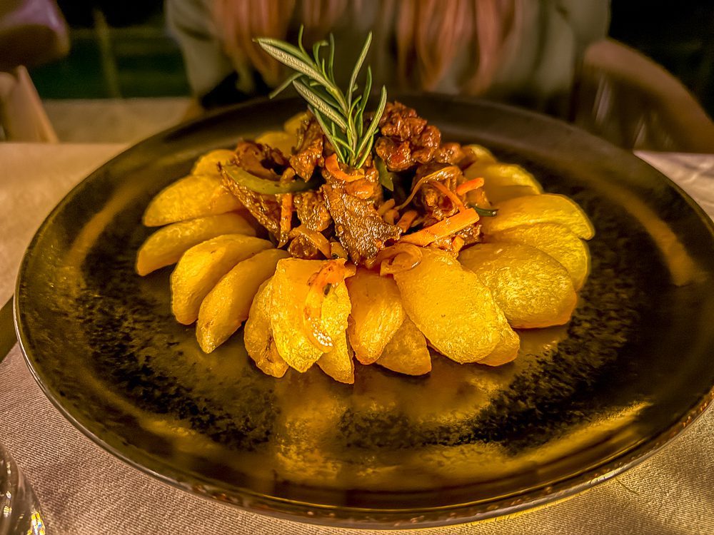 Ugandan lamb stew with roast potatoes