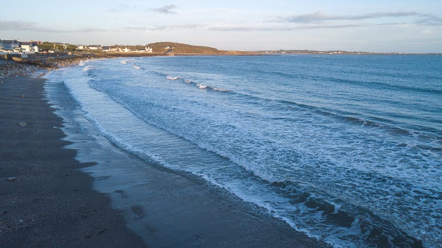 20+ Of The Best Things To Do In Port St Mary, Isle Of Man 5 Gansey Bay in the Isle of Man with sand and waves coming in