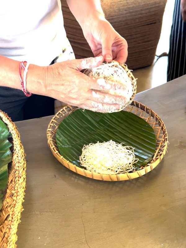 The Best Food In Sri Lanka To Eat (Including 5 Easy Recipes!) 24 removing the string hopper from the bamboo mould and placing on a bamboo plate lined with a banana leaf